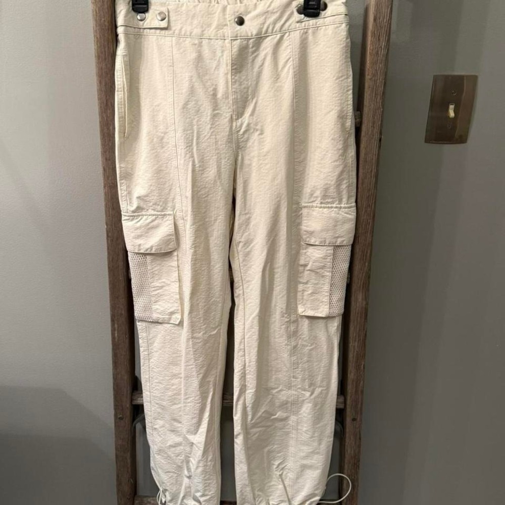 Mono B cream cargo pants with adjustable waist and ankles. Size M